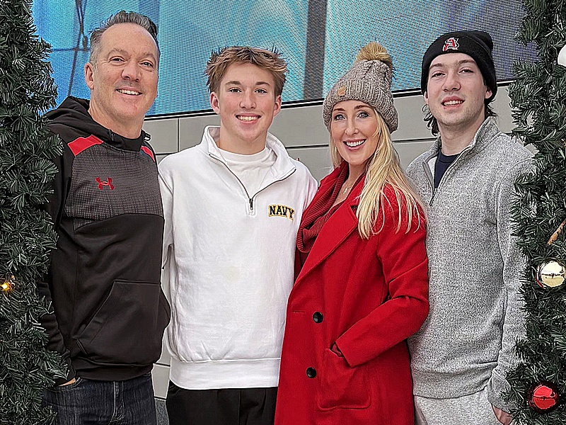 McManus family photo including Tawny.