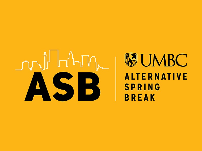 UMBC Alternative Spring Break (ASB) logo on a gold background. The letters "ASB" are in black, bold text beneath a white line drawing of the Baltimore skyline. To the right of the letters and the skyline drawing is the UMBC logo in black with the words "Alternative Spring Break" underneath in black bold text.