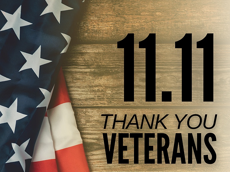 An American flag beside the words (11/11, Thank you Veterans)
