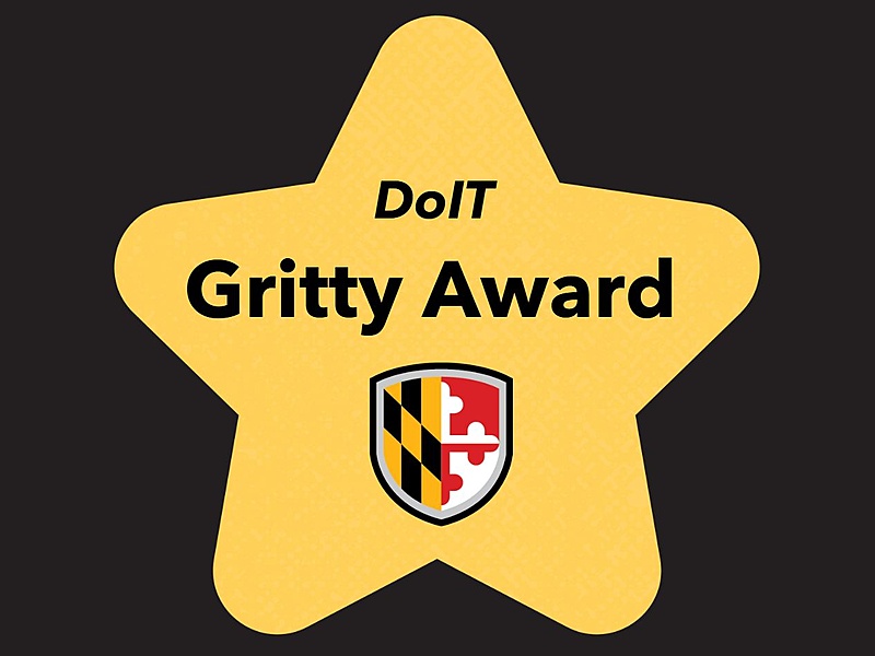 image of a yellow star with the UMBC shield and the text DoIT Gritty Award