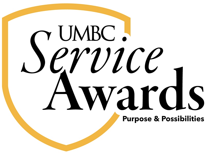 UMBC Service Awards Purpose & Possibilities logo with gold shield