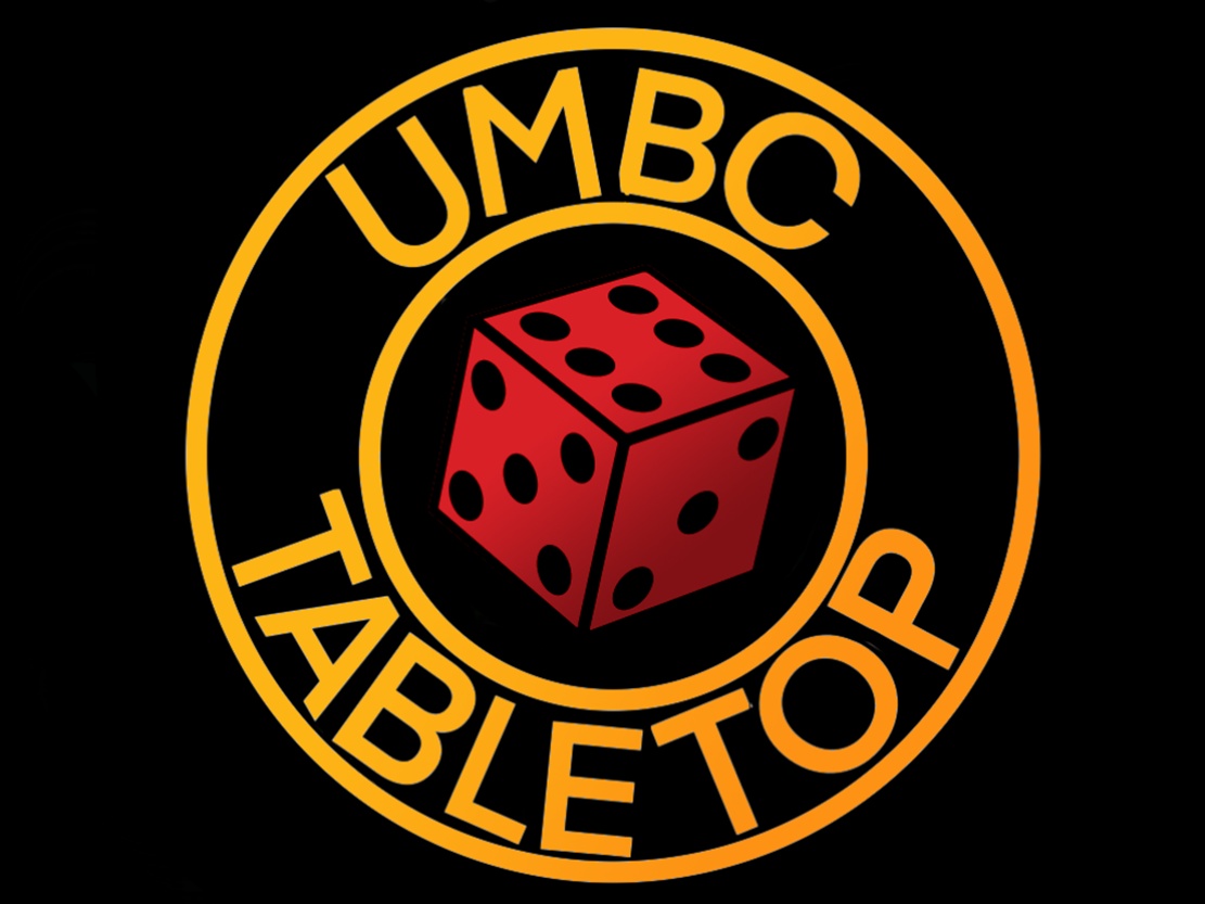 Logo of the Tabletop Gaming Club. Black background with golden rings in the middle, the club title between the two rings and a red die in the middle of the inner ring.