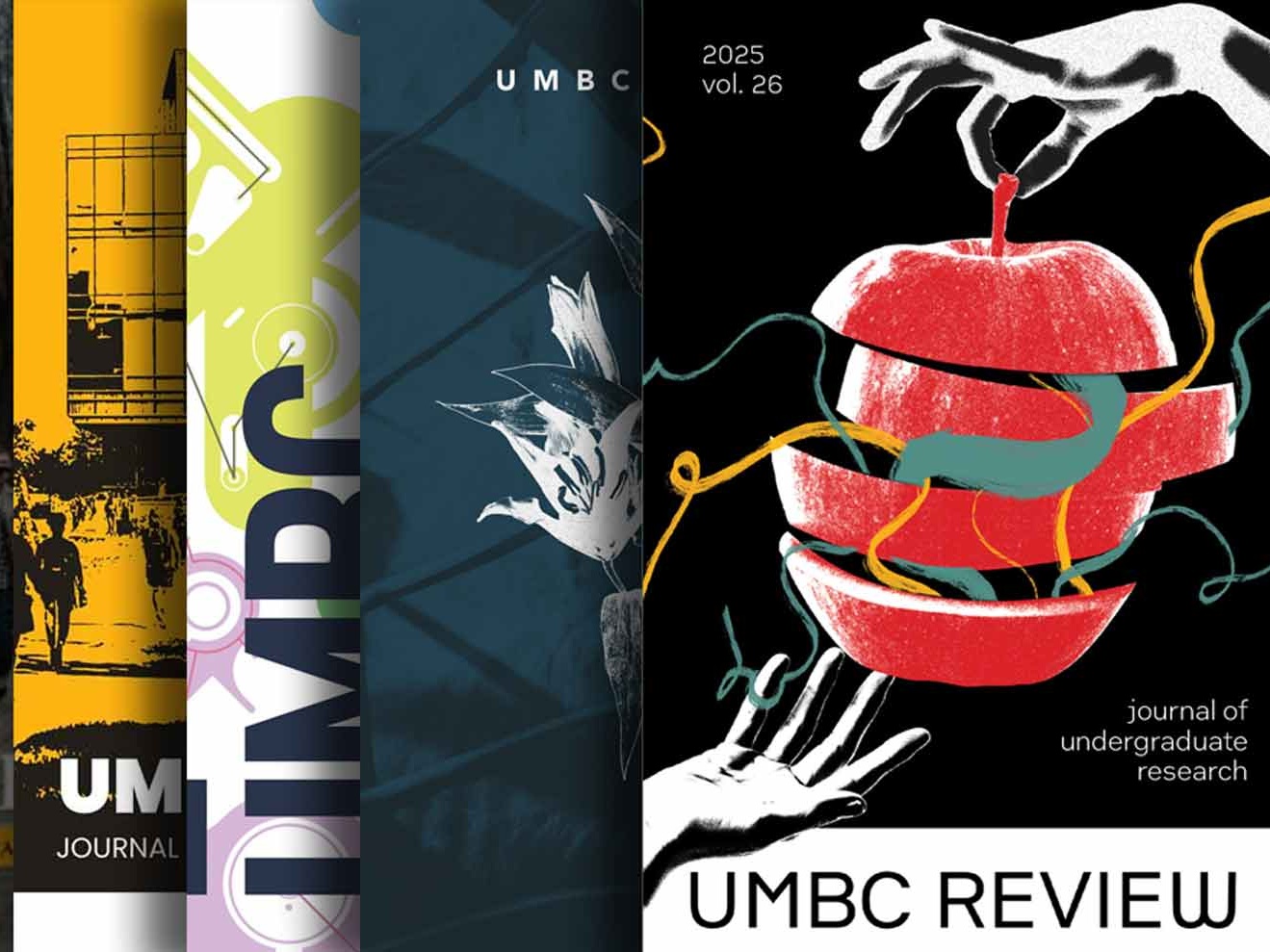 A series of older copies of the U-M-B-C review are stacked upon themselves in an orderly manner.