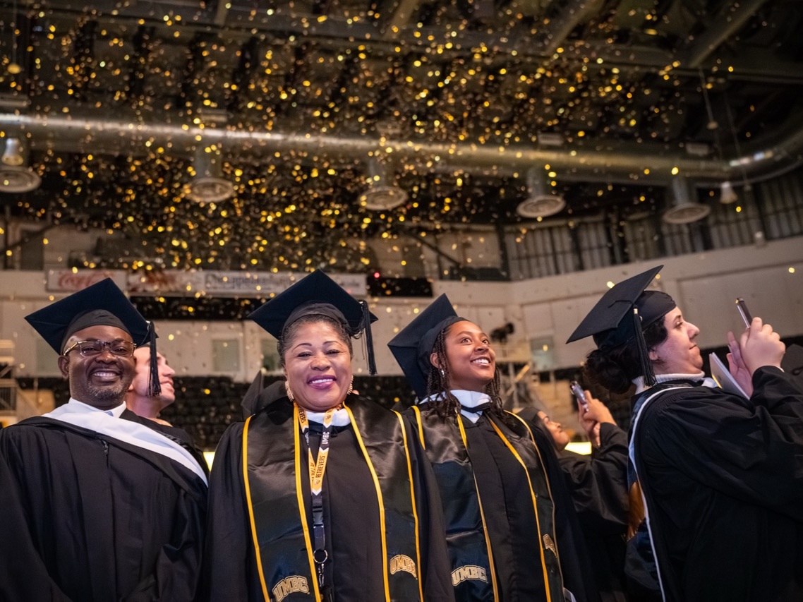 Graduates celebrating at the Winter 2025 Commencement