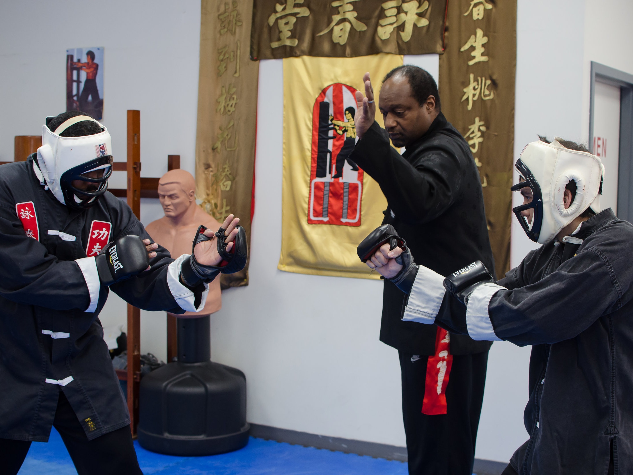 Sifu Spencer coaches a sparring session at his school